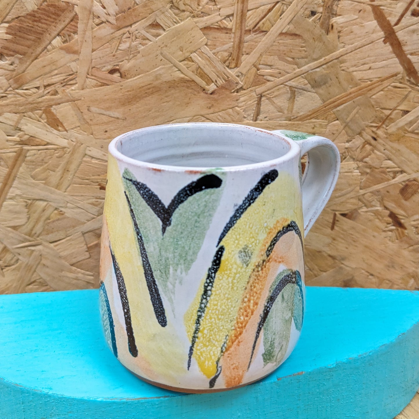 Yellow rainbow mug handmade in leeds