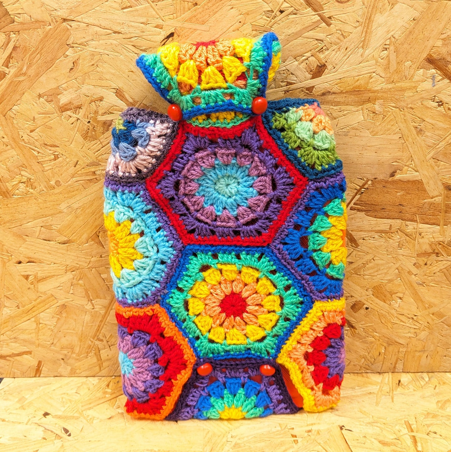 Granny square crochet hot water bottle