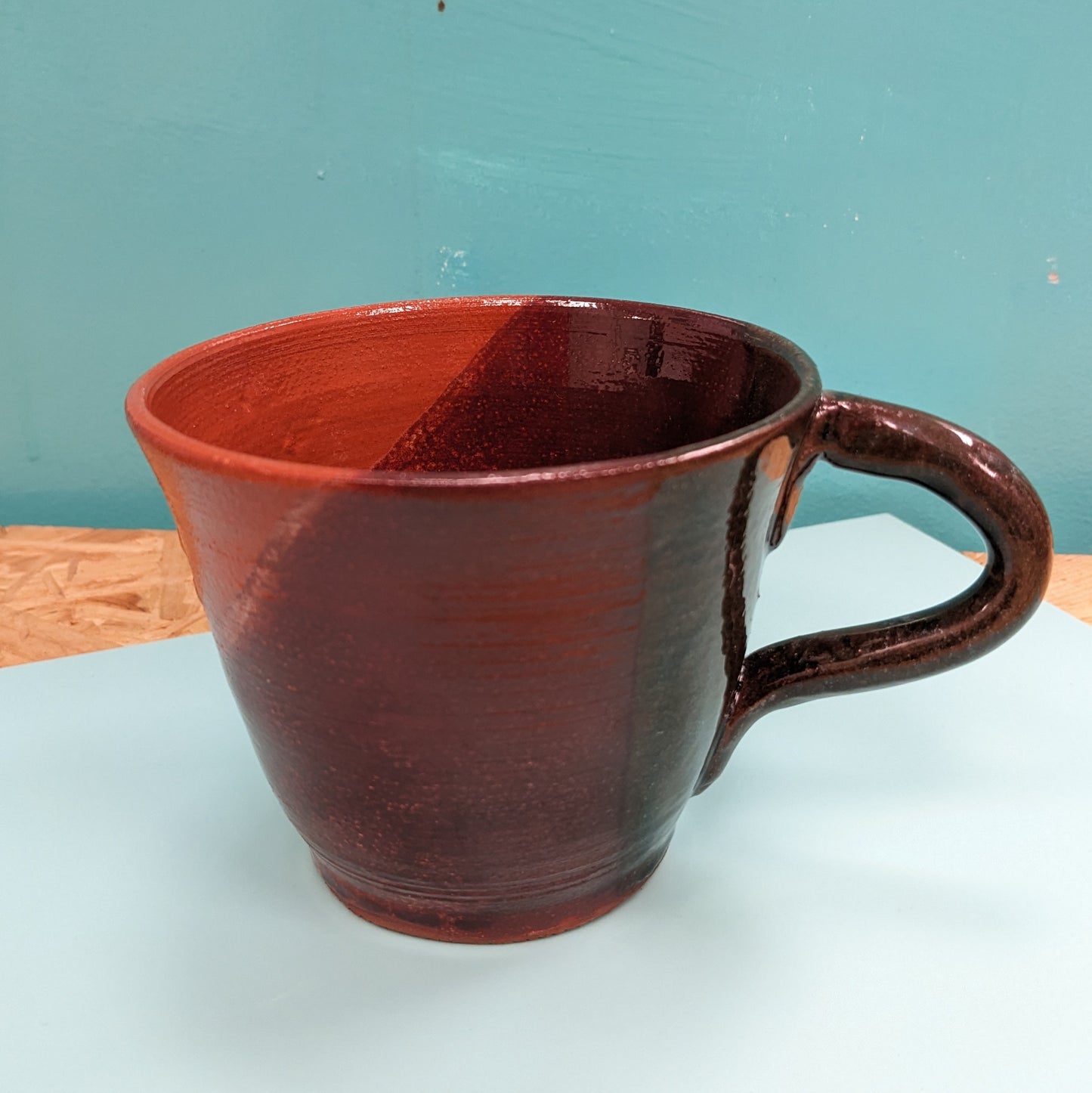 Wide brim abstract face mug handmade in leeds