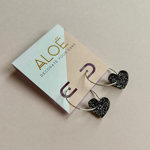 Black sparkly heart earrings