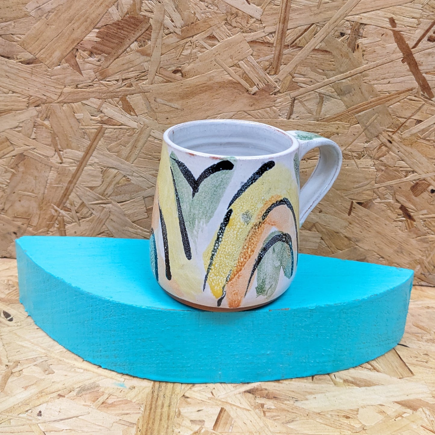 Yellow rainbow mug handmade in leeds