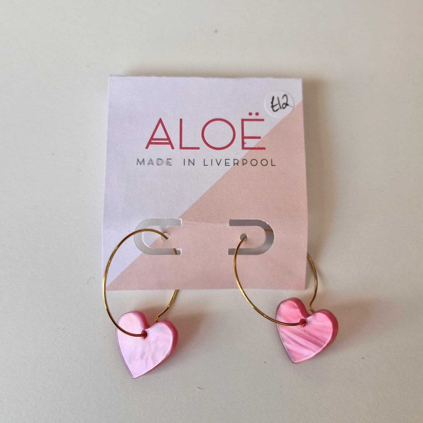 Pink pearlescent heart hoop earrings