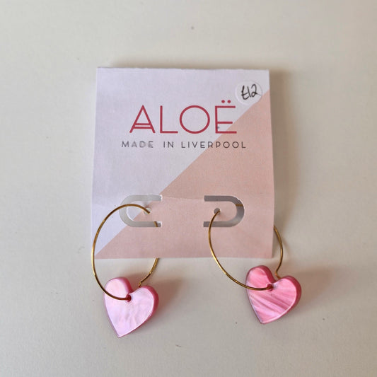 Pink pearlescent heart hoop earrings