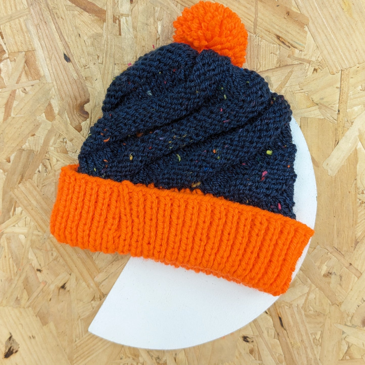 Knitted baby hats with pom pom
