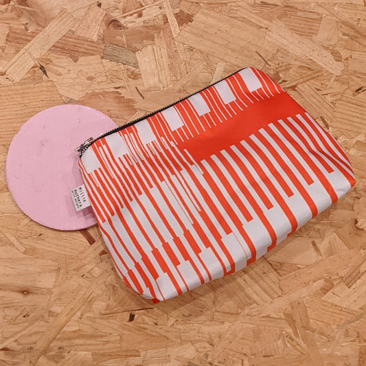 Red and white striped pouch