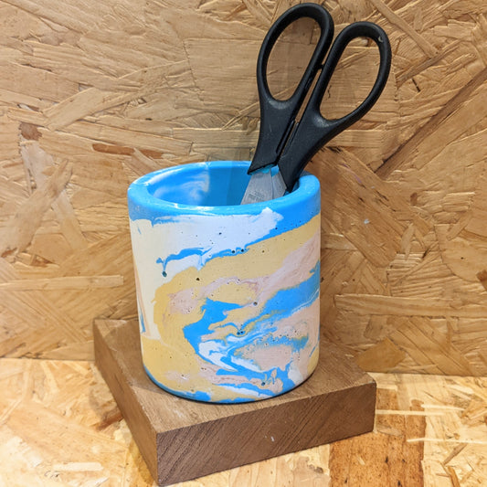 Blue and yellow marble effect pot
